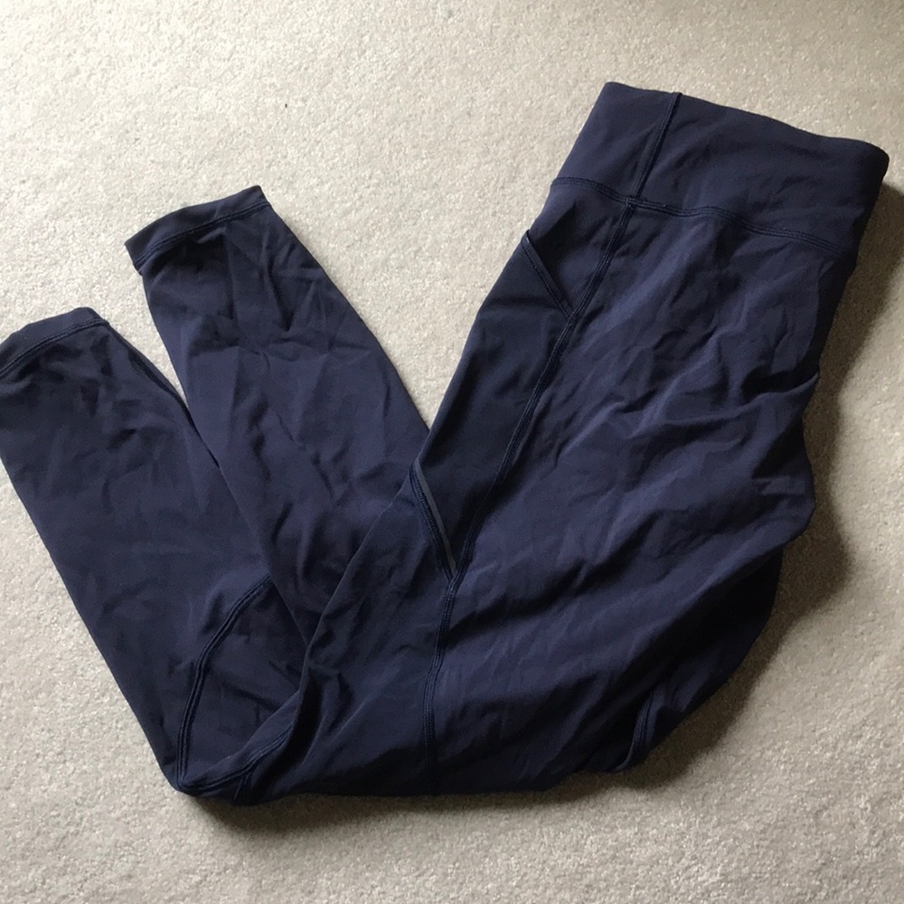 Purple Lululemon pant. Only worn a couple times!